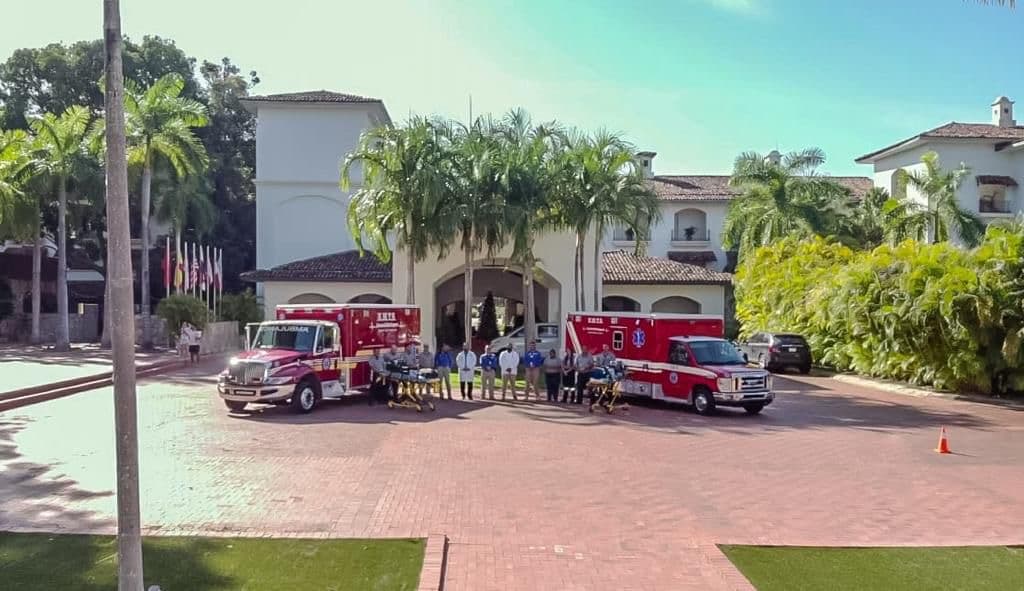 The EMTS team and both ambulances outside the clubhouse at Buenaventura